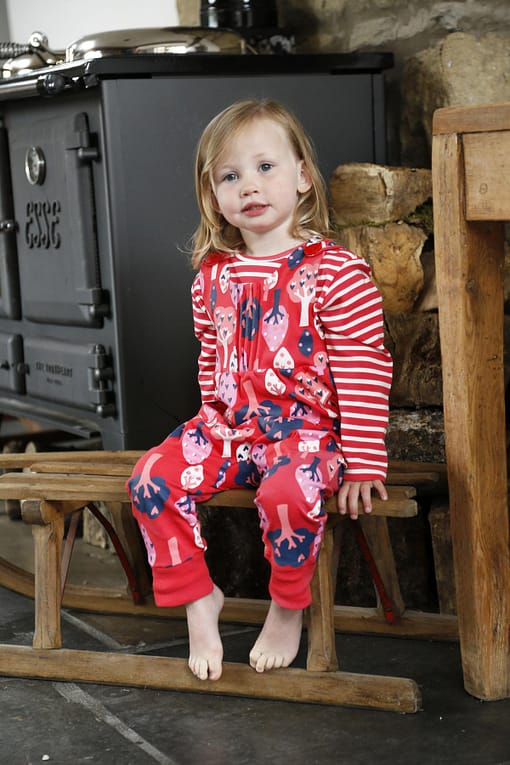 Forest dungarees by Piccalilly on red organic cotton 2