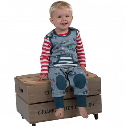 Organic cotton dungarees in tractor print by Piccalilly