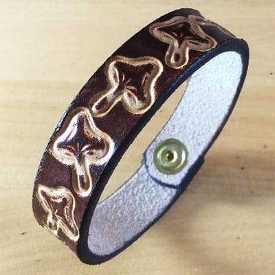 Toadstools on handmade brown leather bangle
